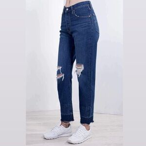 Levi’s 501 high-waisted dark-wash distressed jeans. 💙